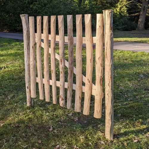 Hazel gate beckoning you into a world of tranquility.