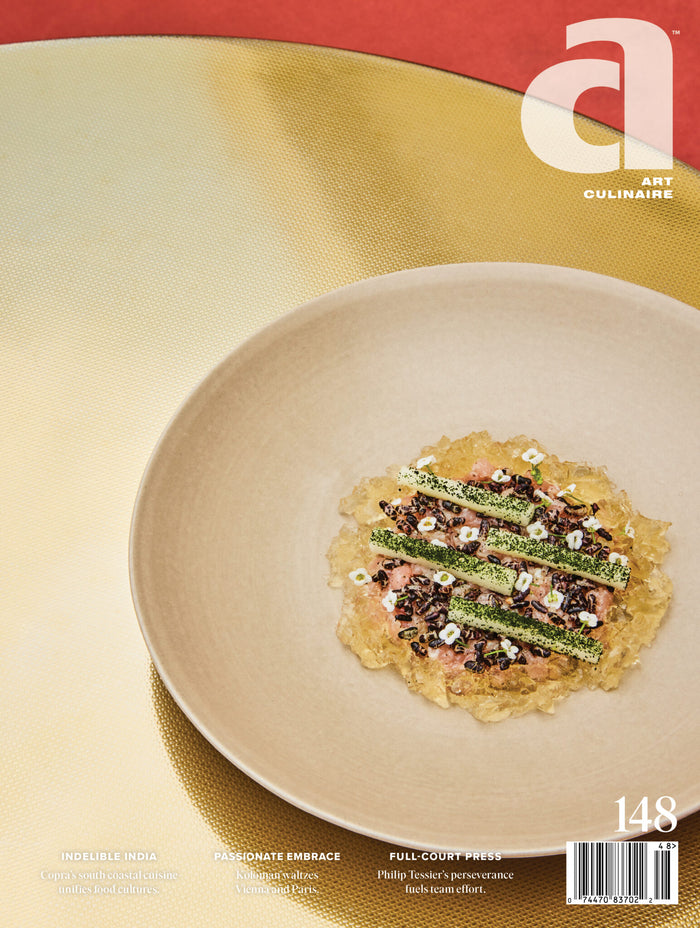 Cover of Art Culinaire Magazine featuring a plated dish on a white plate with a colorful background.