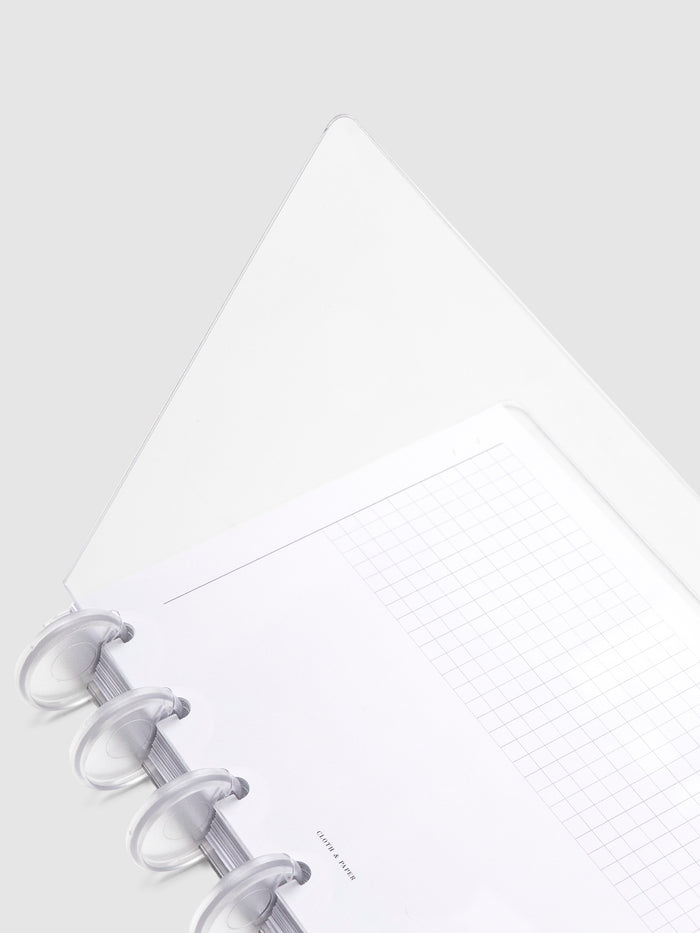 Crystal Clear Discbound Notebook Cover, HP Mini, Cloth and Paper. Close up image of notebook covers in use with clear rings and an insert. The front cover is opened halfway.