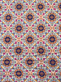 Flutter -Stylised Butterfly Medallions in orange, pink and cream