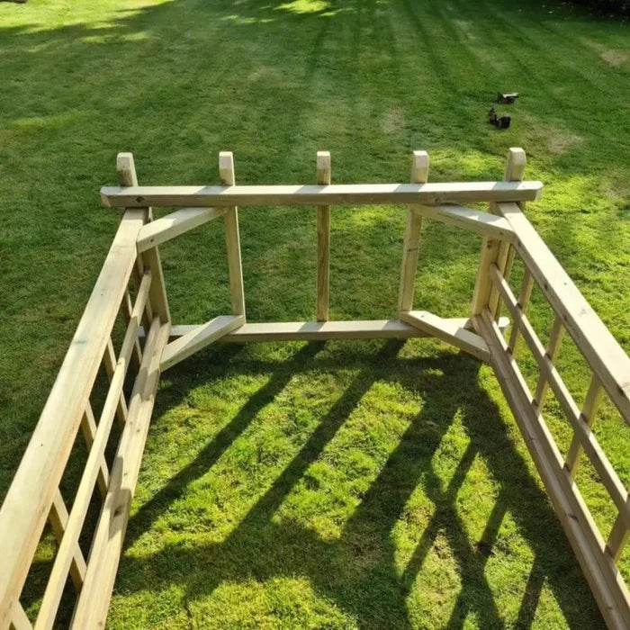 A delightful wooden arch welcomes visitors to the garden.