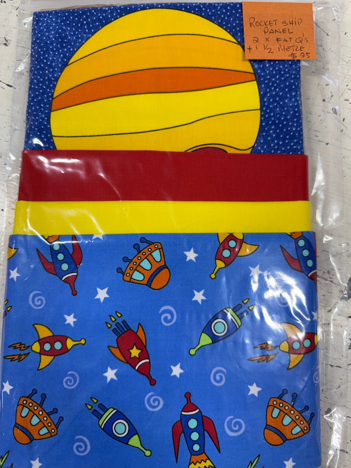 Rocket Ship to the Stars Fabric Panel Kit with extra fabric.