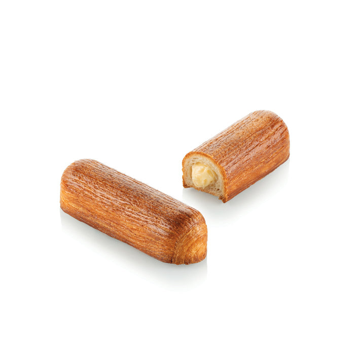 Two  cylindrical pastries with one cut open to reveal a cream filling on a white background