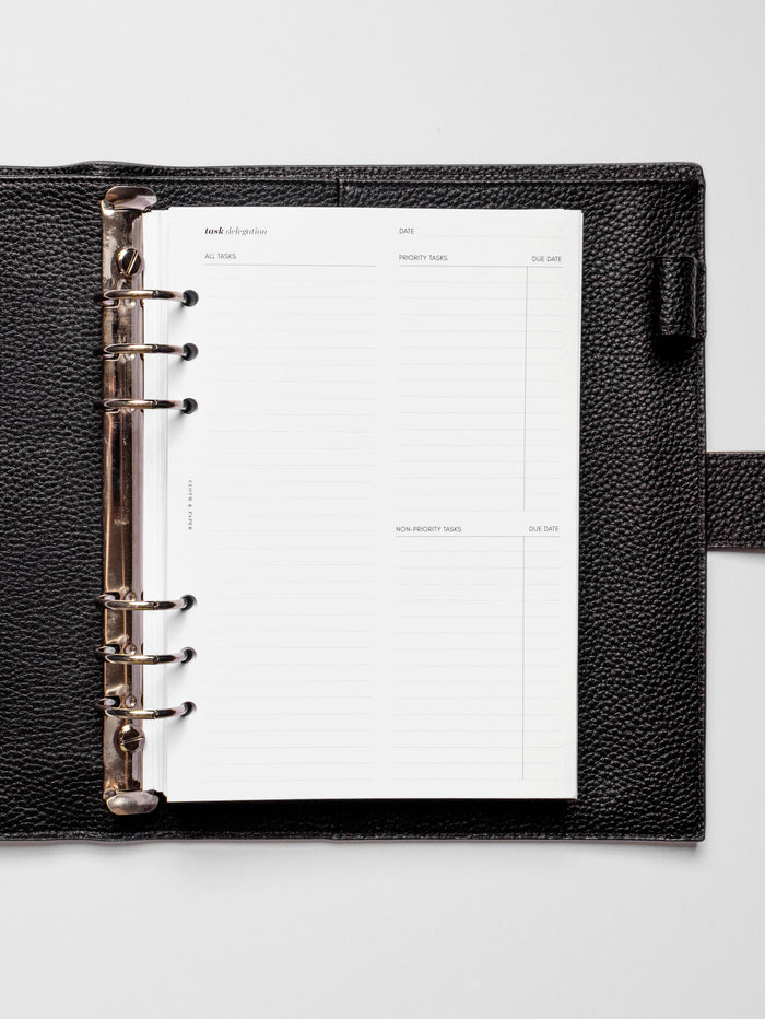 Insert in use inside a black leather planner.